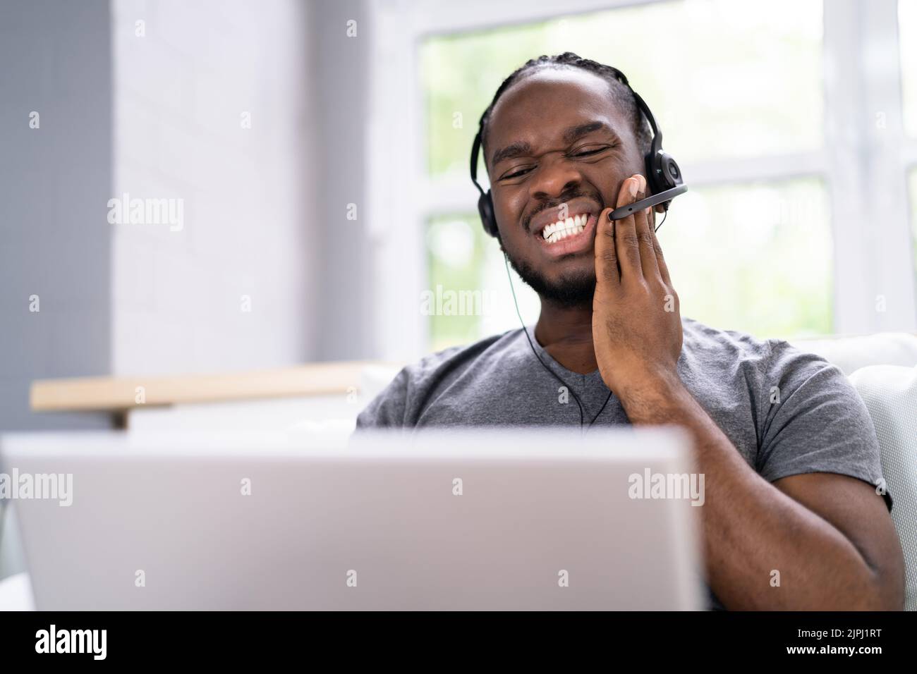 Sore Tooth Problems And Teeth Pain Doctor Video Conferencing Stock