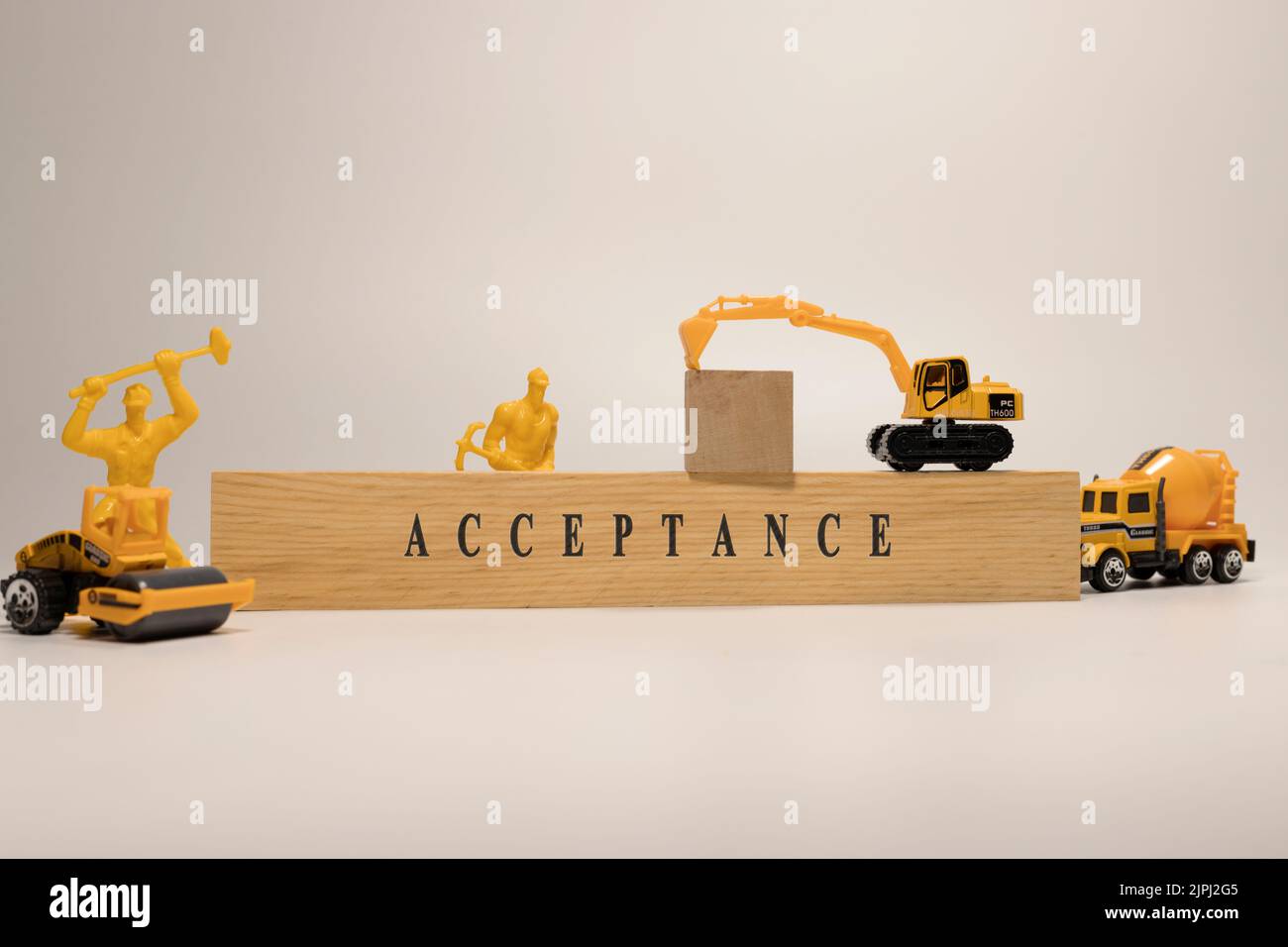 acceptance written on wooden surface. Mortgage and finance Stock Photo