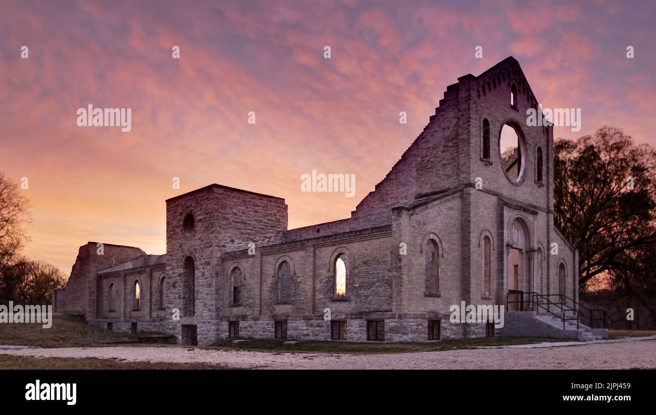 A scenic view of the ruins of an old monastery at sunset in Trappist Provicial Heritage Park Stock Photo