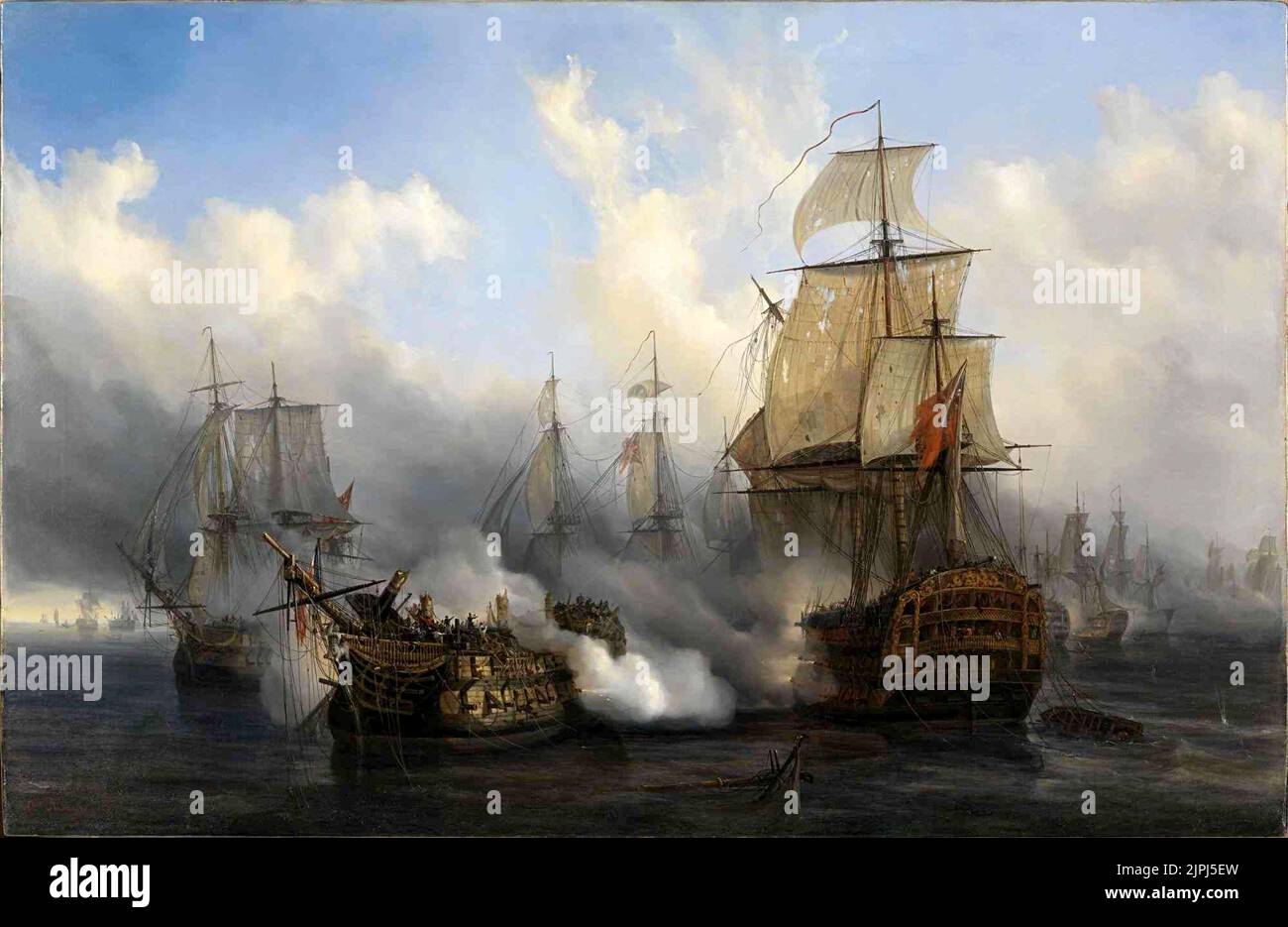 The British HMS Sandwich fires at the French flagship Bucentaure (completely dismasted) in the battle of Trafalgar. Bucentaure also fights HMS Victory (behind her) and HMS Temeraire (left side of the picture). HMS Sandwich did not fight at Trafalgar and her depiction is a mistake by the painter. By Auguste Étienne François Mayer Stock Photo
