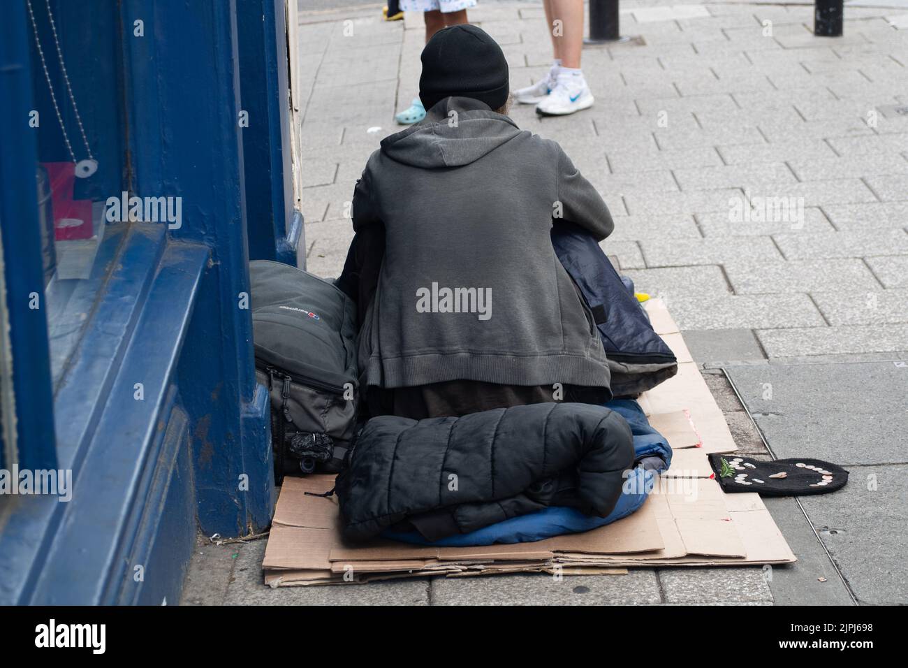 Windsor, Berkshire, UK. 18th August, 2022. People come to beg for money in Windsor particularly on the days when there is a Changing of the Guard and the town is busy. Credit: Maureen McLean/Alamy Stock Photo