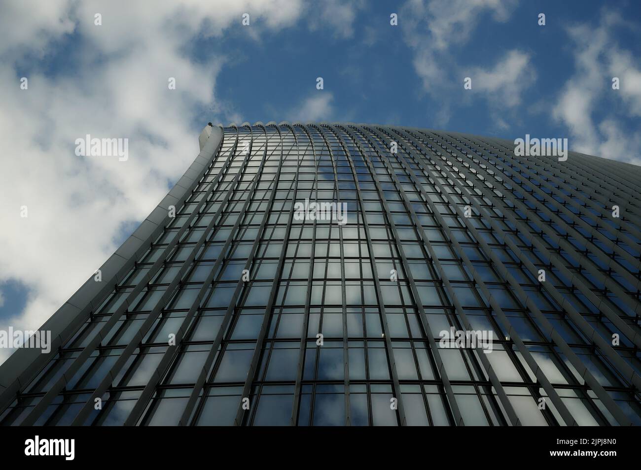 Glass fronted office building in London with softened effect and blue ...