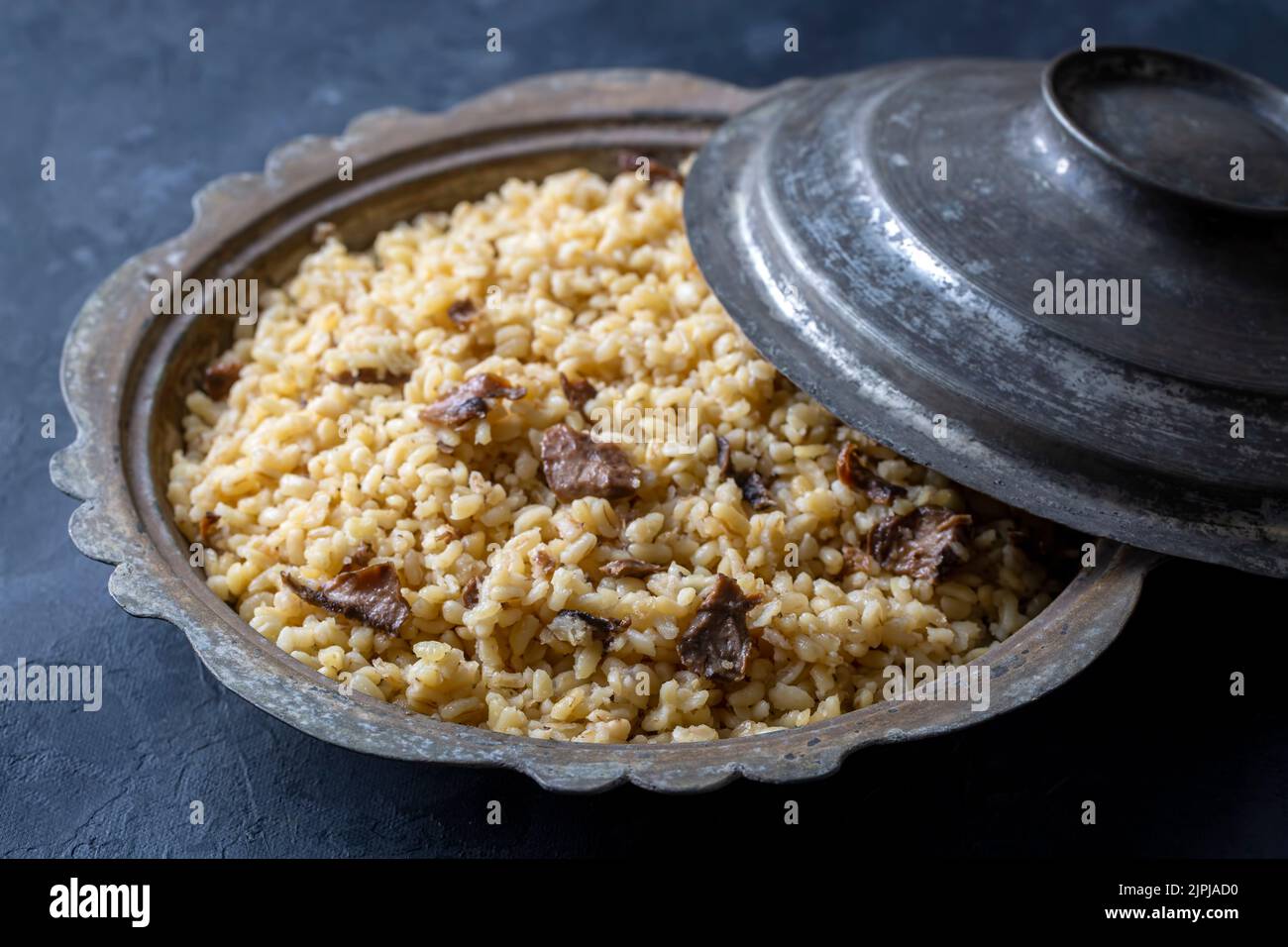 Turkish foods; Bulgur pilaf with mushrooms (Turkish name; mantarli ...