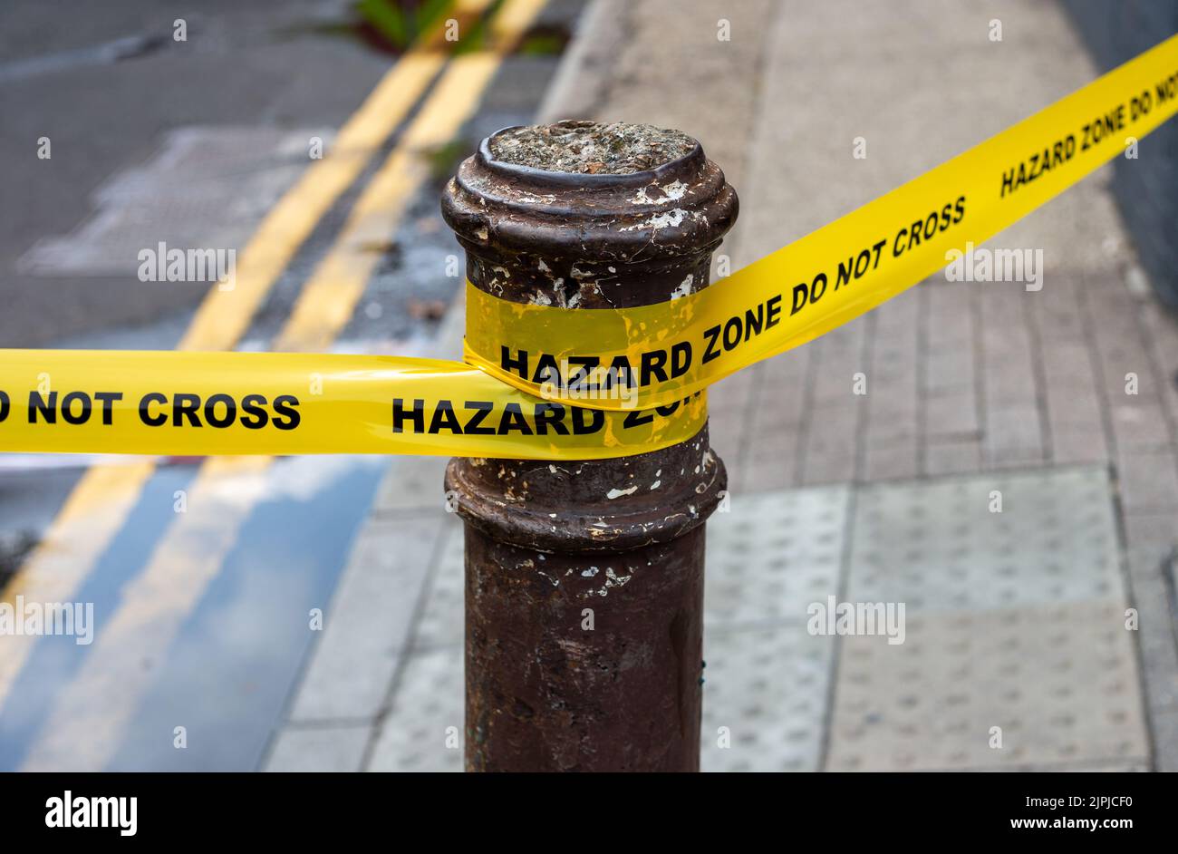Safety and hazard yellow tape Stock Photo