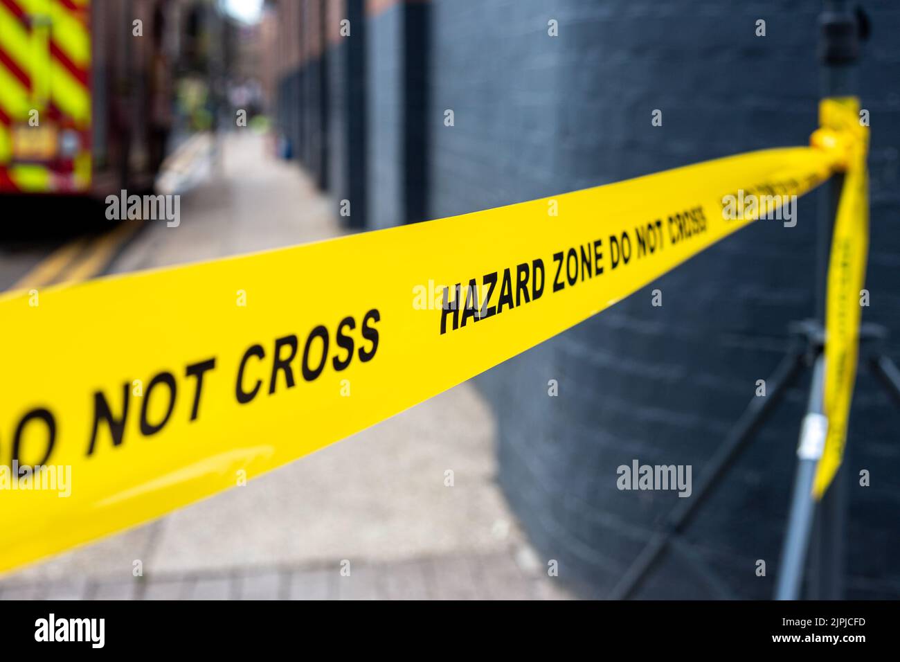 Safety and hazard yellow tape Stock Photo