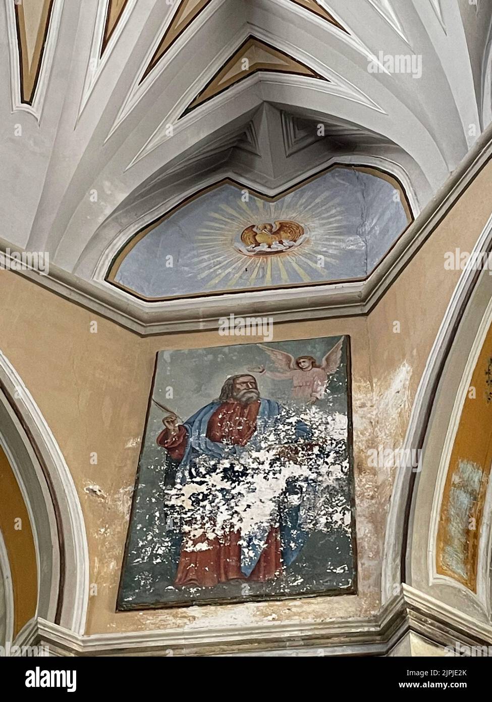 Carovigno, Italy. Deteriorated painting inside the14th century Chiesa Madre o di Santa Maria Assunta in Cielo. Stock Photo