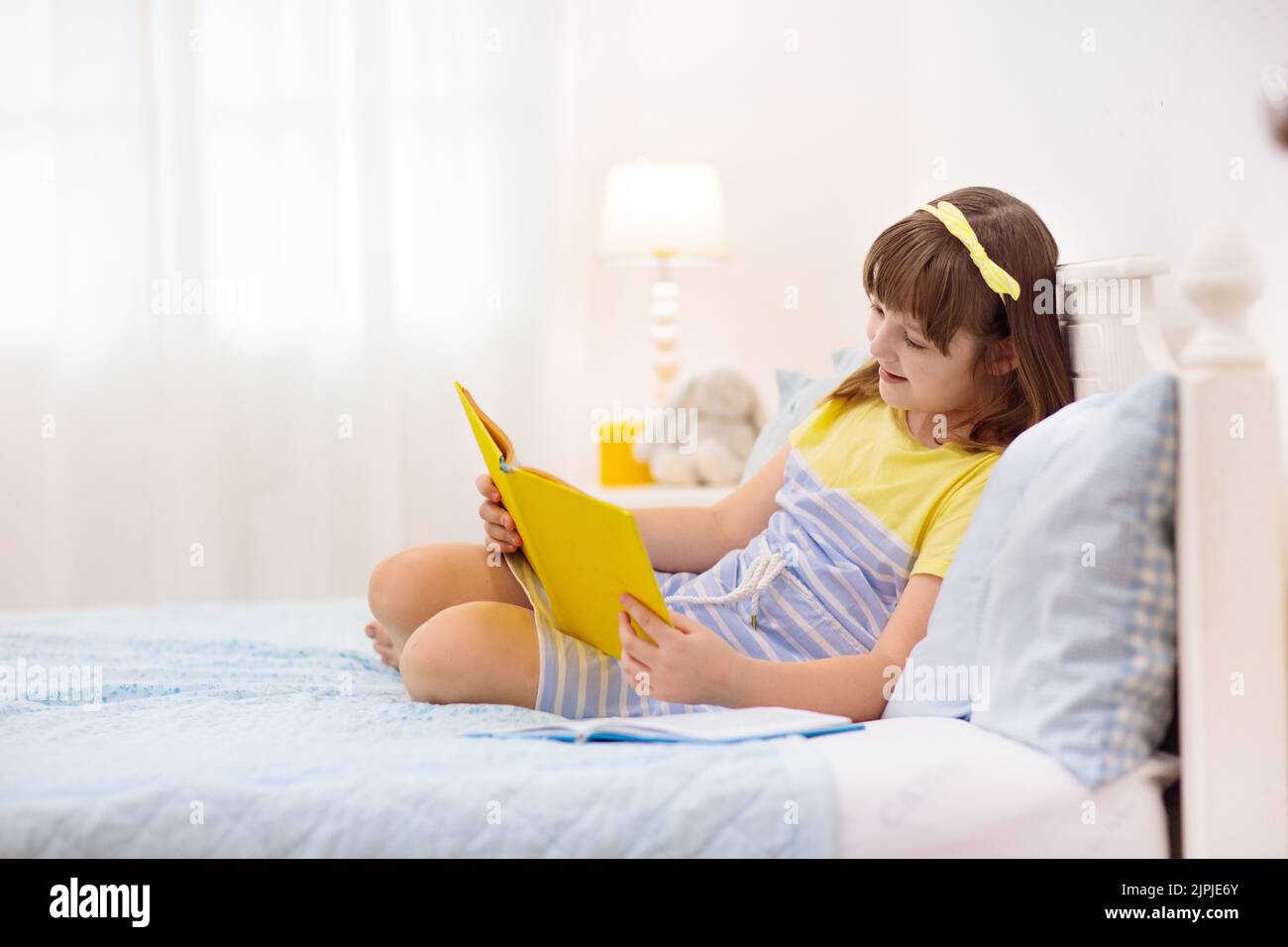 Teenager Girl Reading Book In Bed. Kids Read. School Child Doing ...