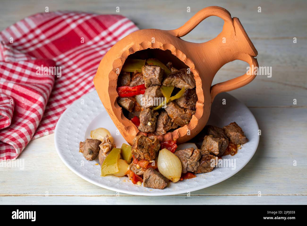 Authentic Turkish Testi Kebab cooked in earthenware waterjug, Turkish name; Testi kebabi Stock Photo
