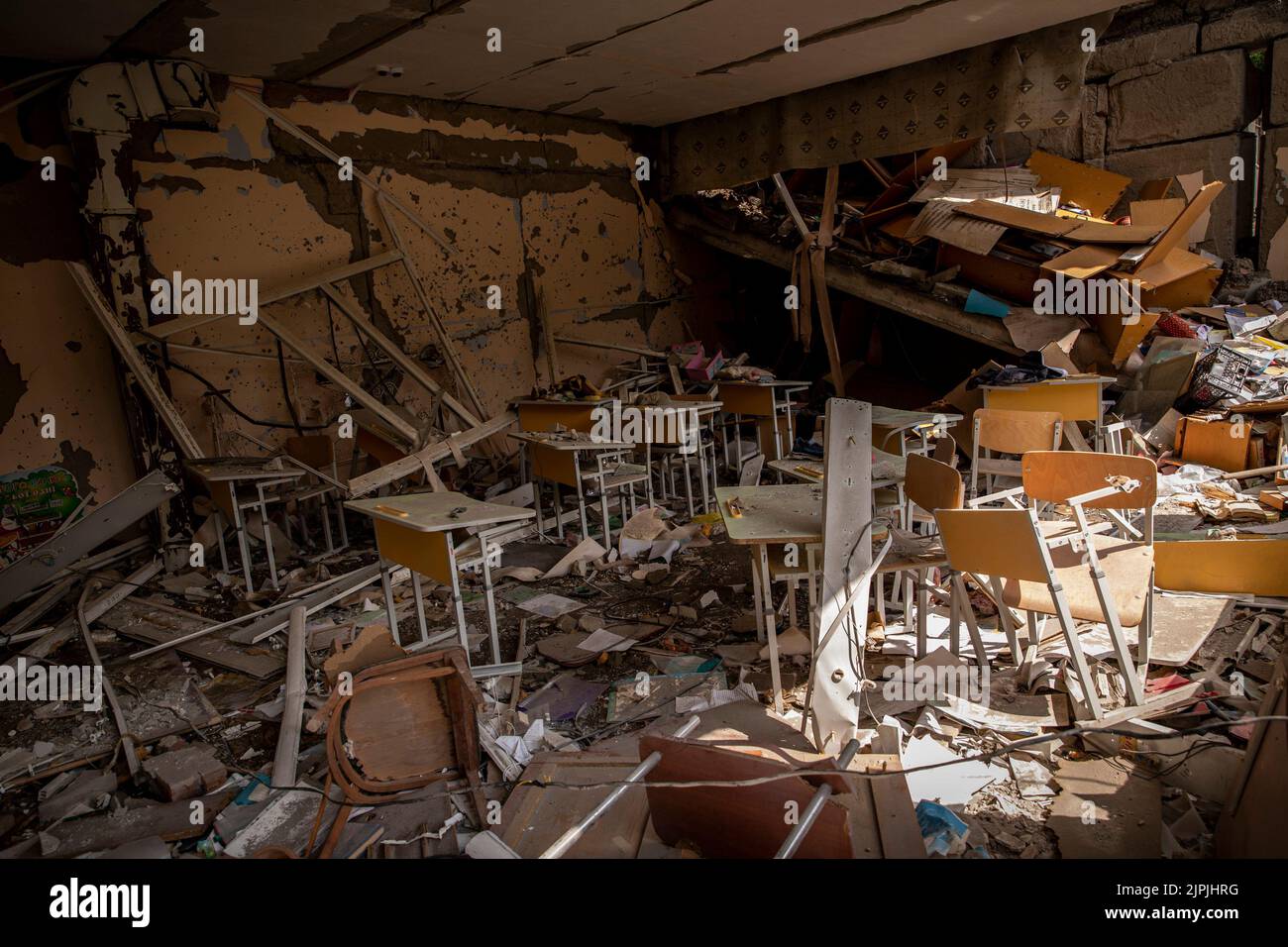August 18, 2022, Mykolayivs'ka Oblast'', Ukraine: An interior view of a destroyed classroom at a school that was struck by a Russian airstrike in Mykolaiv Oblast. As Ukrainian officials have claimed partiality to recover their territory and launching a counter-offensive in the south axis of the country including Mykolaiv Oblast, the area has been under heavy fighting, and villages surrounding Mykolaiv city have been under heavy shelling from Russian forces. (Credit Image: © Alex Chan Tsz Yuk/SOPA Images via ZUMA Press Wire) Stock Photo