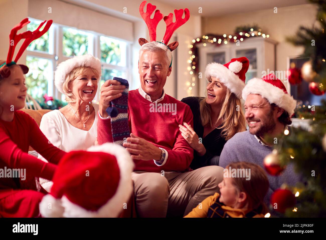 christmas, family, christmas eve, unpacking, grandparent, christmas present, merry christmas, x-mas, xmas, families, christmas eves, grandparents, Stock Photo