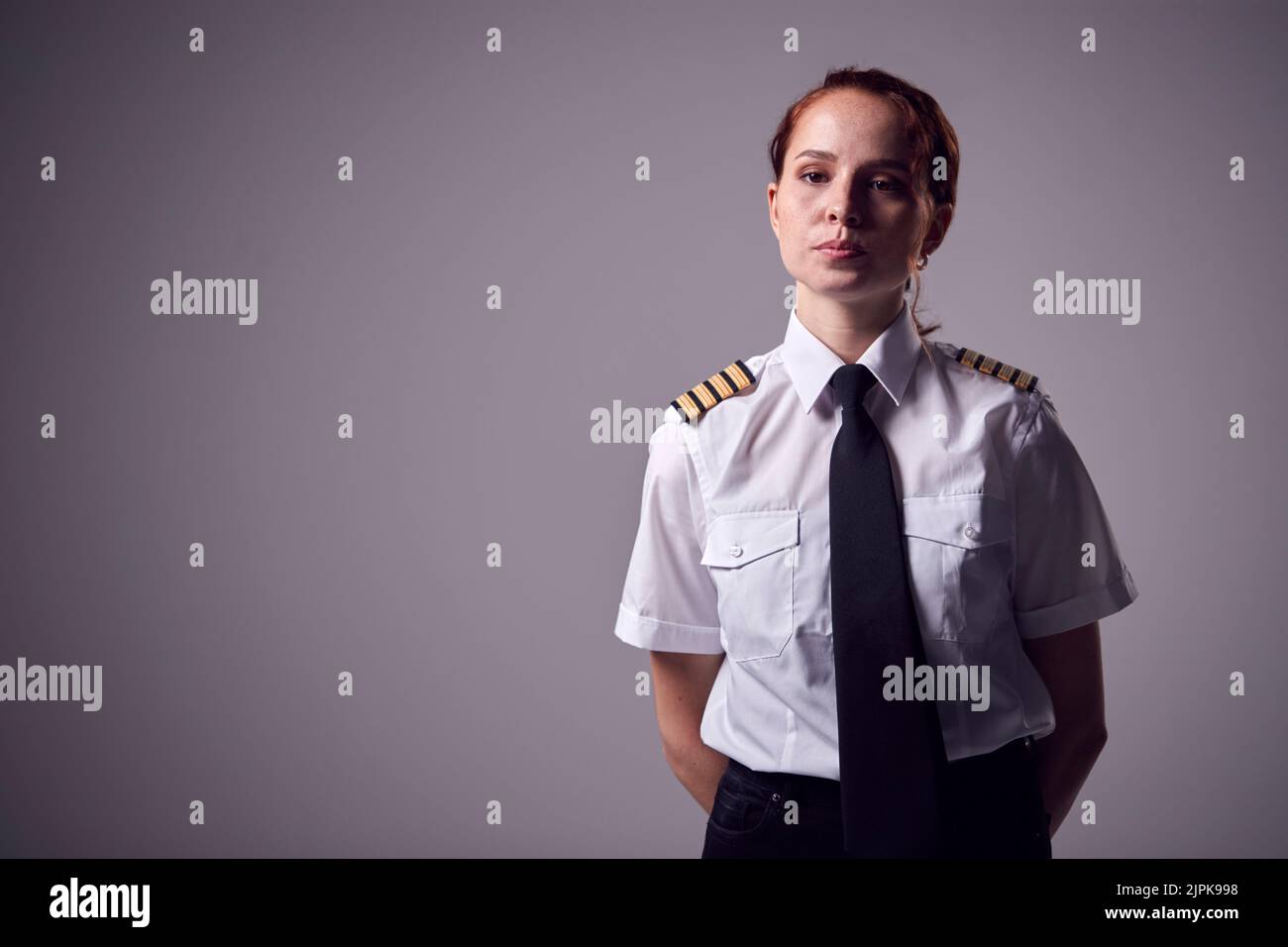 Pilot and female cabin crew hi-res stock photography and images - Alamy