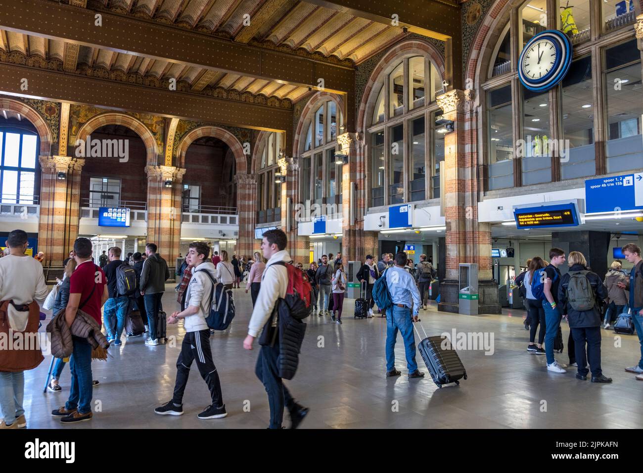 Interior Amsterdam Centraal Train Station with travelers, Amsterdam , Holland Stock Photo