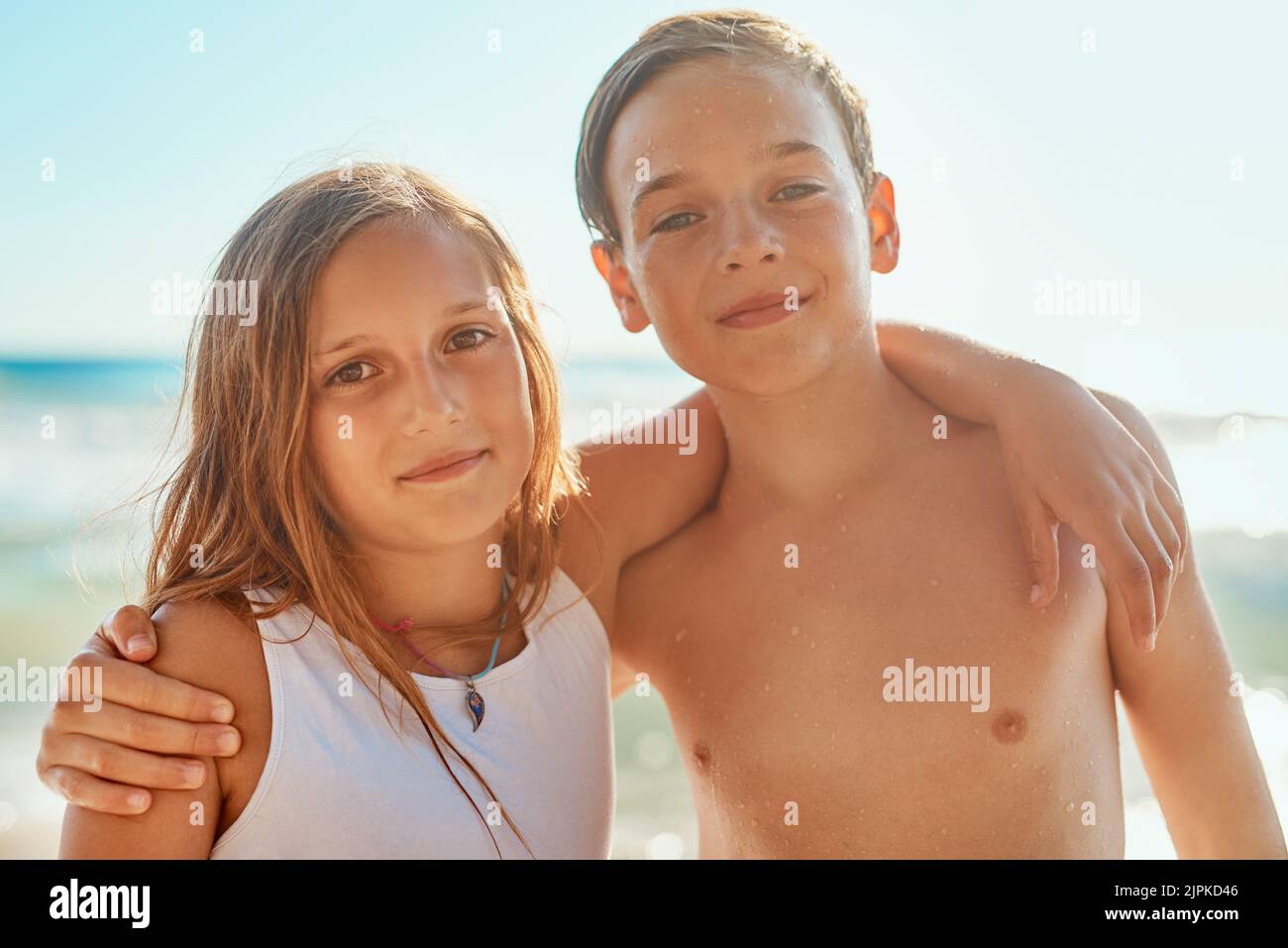 Everyone is closer at the beach. Cropped portrait of a brother and