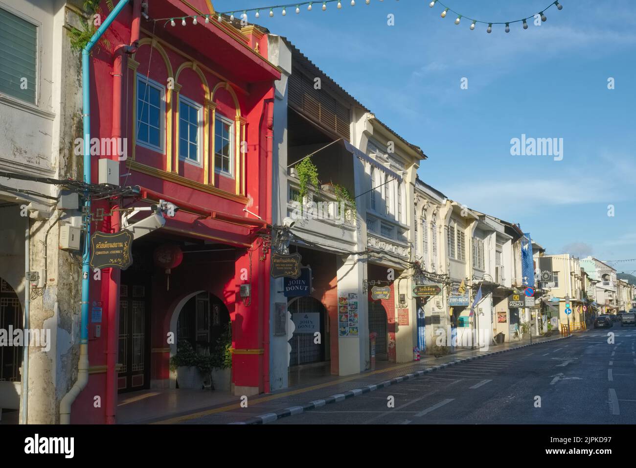 Colourful traditional Sino-Portuguese or Peranakan shophouses in Thalang Road in the Old Town heritage area of Phuket Town, Thailand Stock Photo