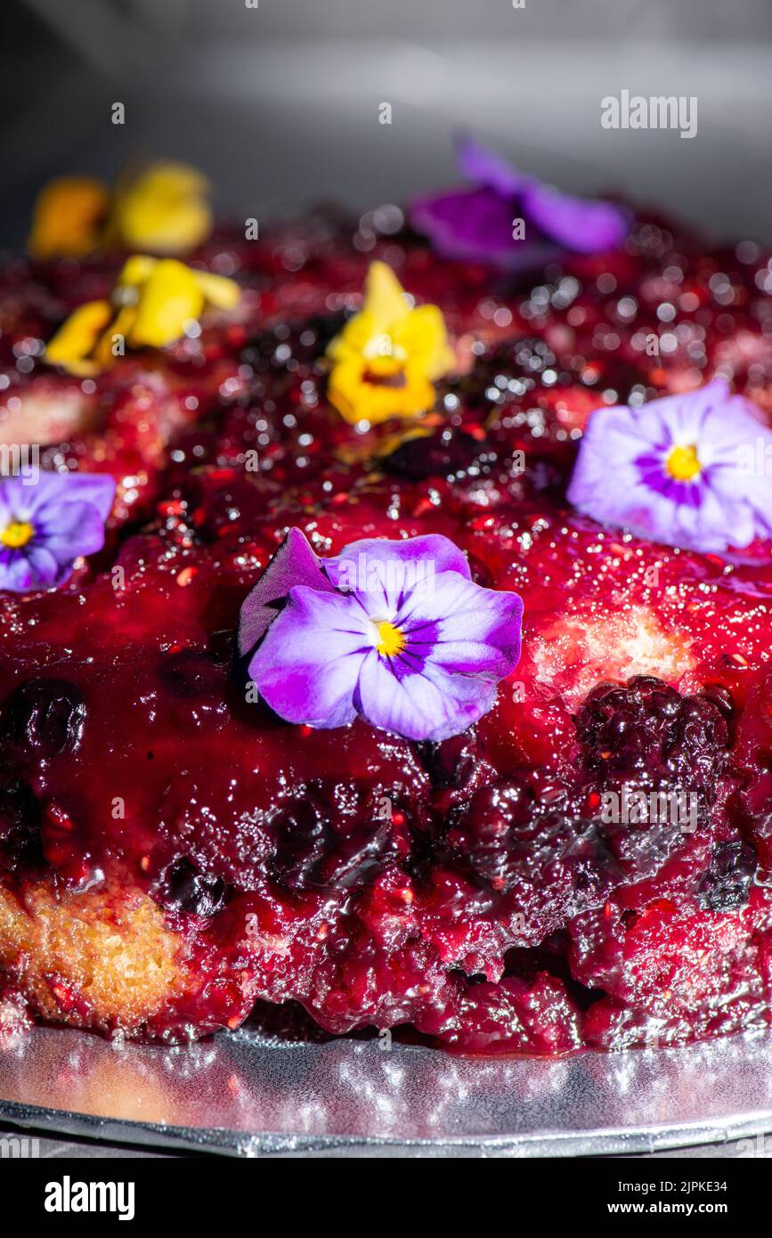 Homemade upsidedown cake with mixed berries including organic