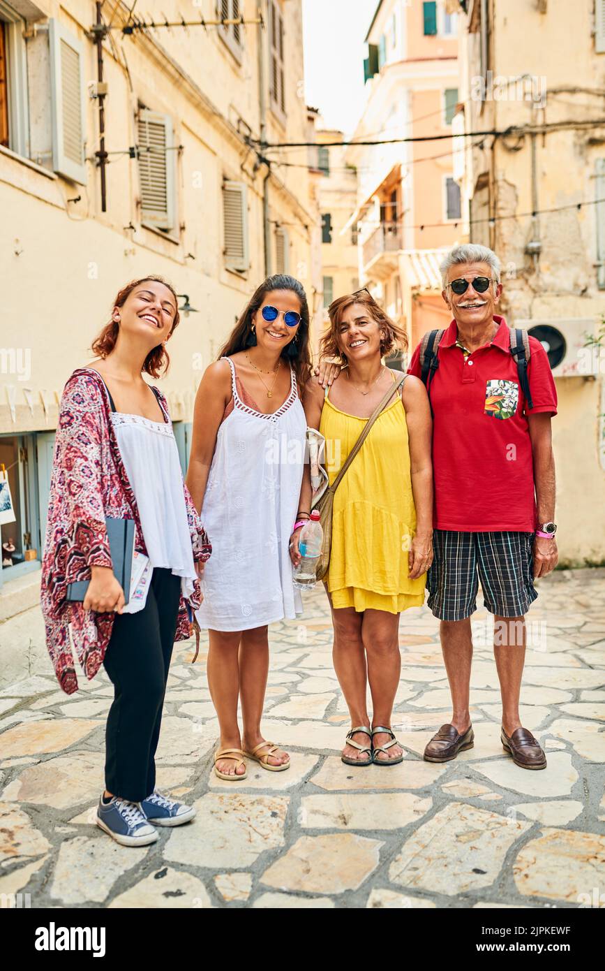 Sight seeing with the best people in my life. Full length portrait of a family of four travelling in a foreign city. Stock Photo