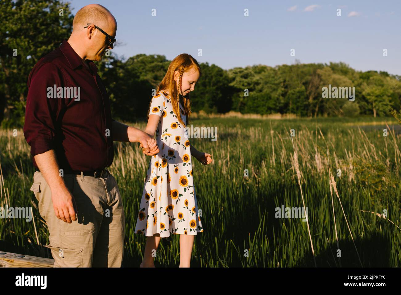 Father holds daughters hand hi-res stock photography and images - Alamy
