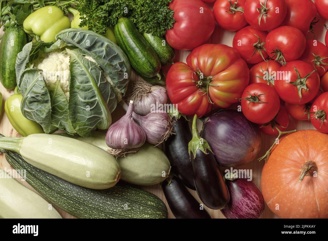 Many different fruits vegetables greens on the table Stock Photo Alamy
