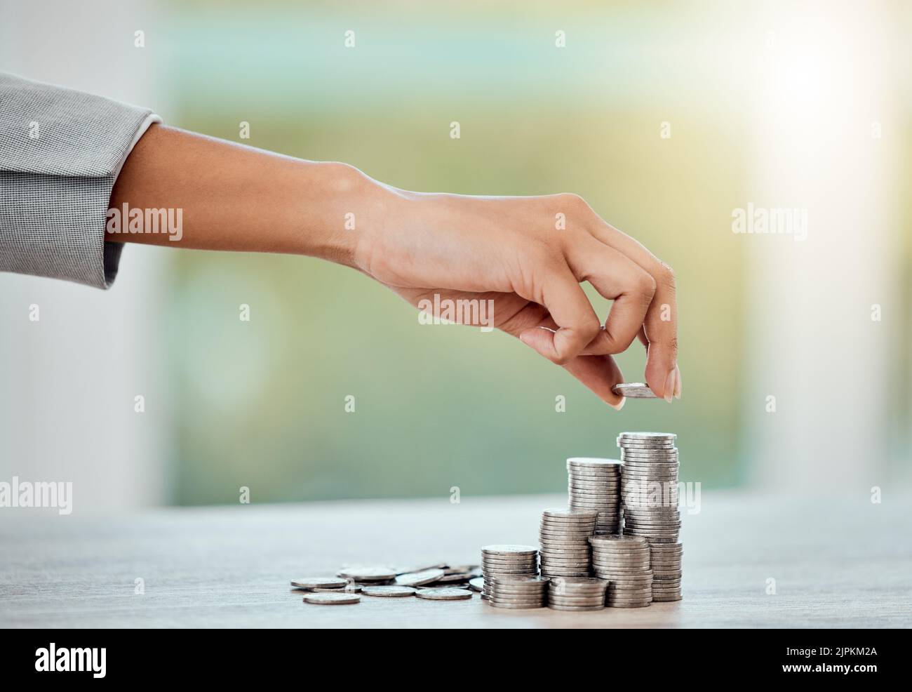 Saving, money and growth for small business finance, coin stack of money for growing economy. Financial wealth and investment for profits, accounting Stock Photo