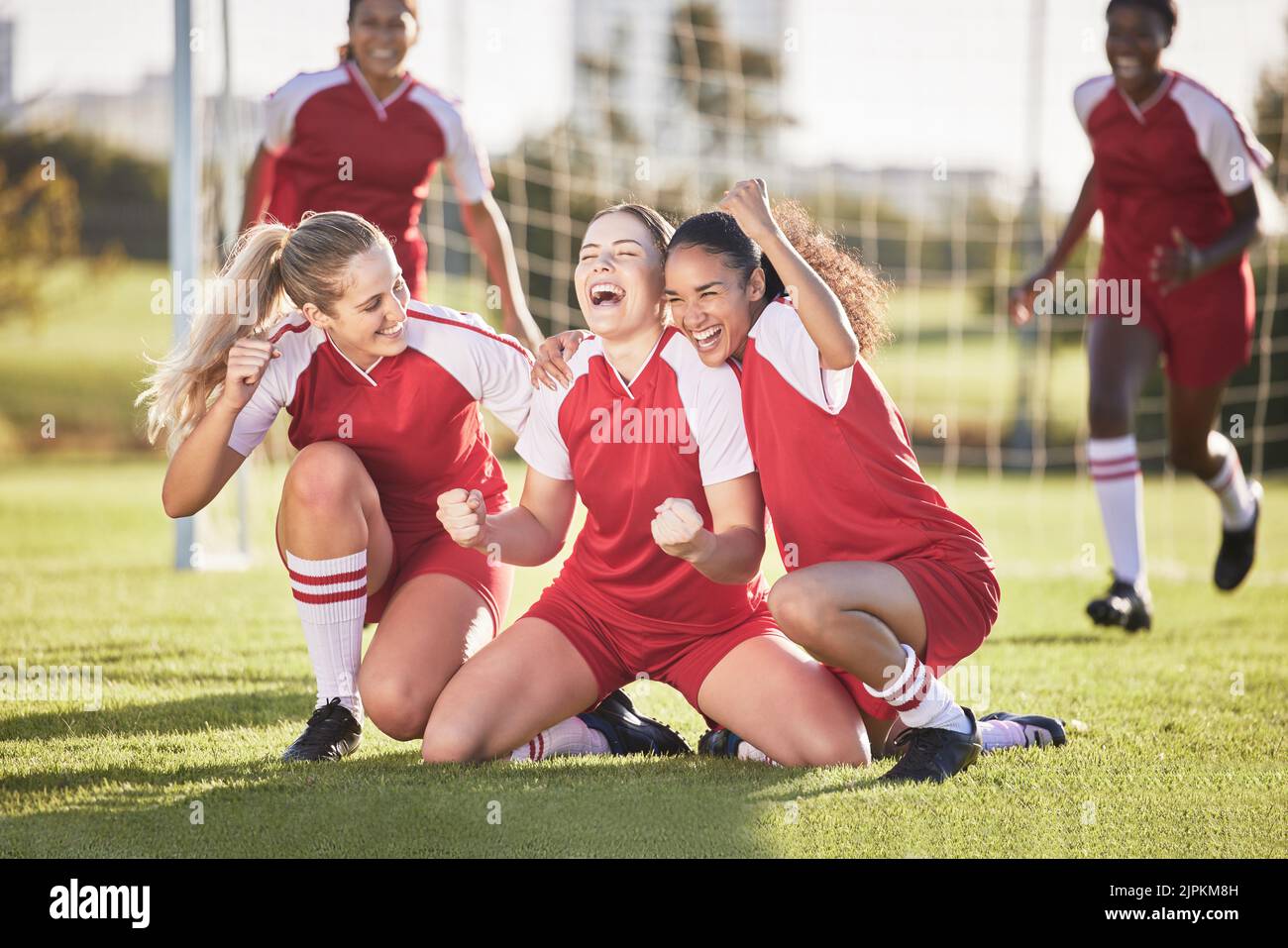 Celebrate, winning and success female football players with fist pump