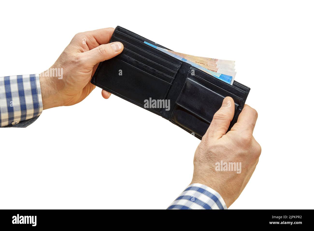 Man hands hold black wallet with money inside on white background. Employee shows cash after getting salary. Employment and profit concept closeup Stock Photo