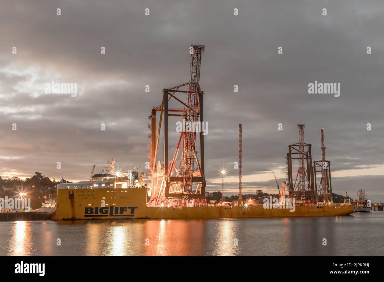 Rushbrooke, Cork, Ireland. 19th August, 2022. The first of three ship to shore container cranes is  loaded on to the deck of the ship Biglift Baffin at Cork Dockyard, Rushbrooke, Co. Cork, Ireland. Built by Liebherr in Killarney the cranes are the largest single objects ever engineered in Ireland to be shipped out of the country to dockyards in New York and New Jersey. Credit; David Creedon / Alamy Live News Stock Photo