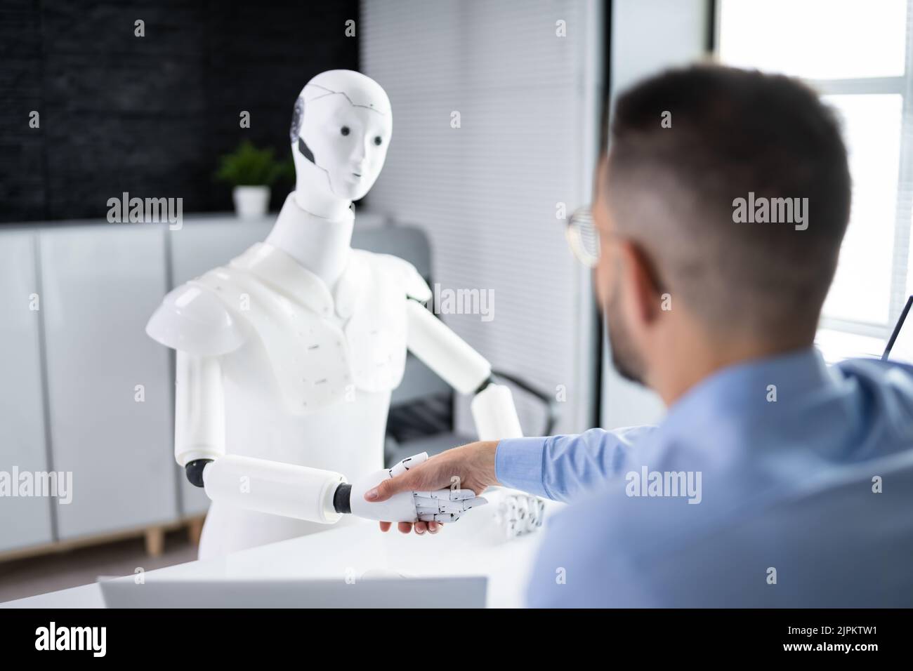 Men At Interview With AI Robot Machine Stock Photo Alamy