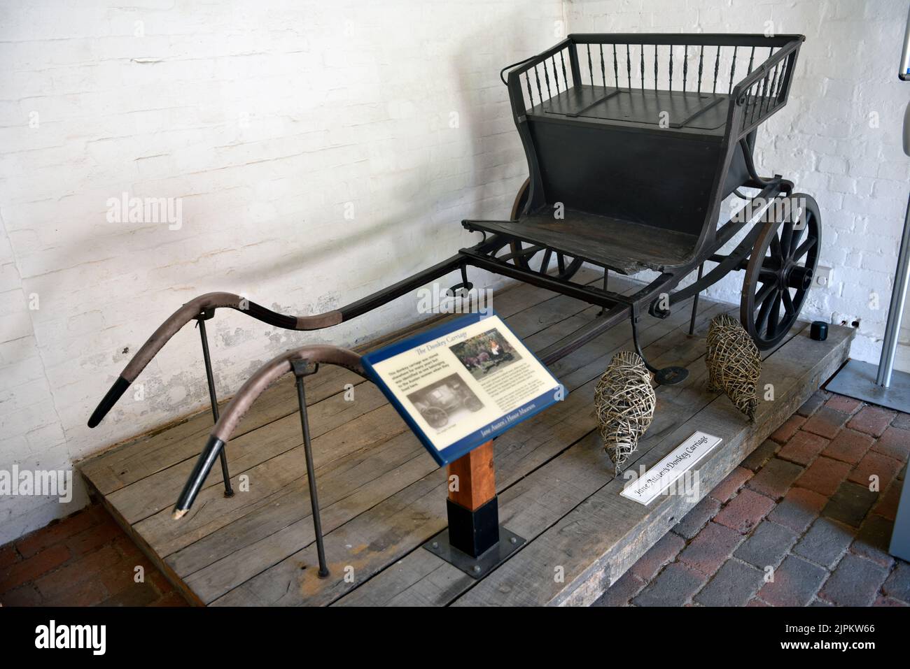 Jane Austen’s Donkey Carriage on display at Jane Austen’s House, Chawton, near Alton, Hampshire, UK. Stock Photo