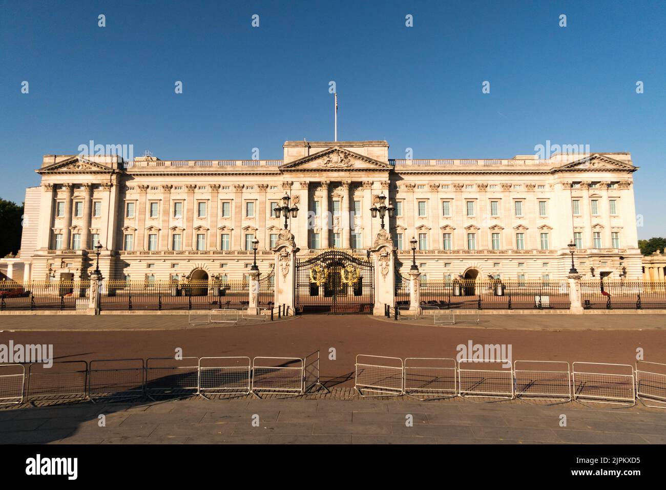 A view of the facade of Buckingham Palace on a sunny day in London Stock Photo
