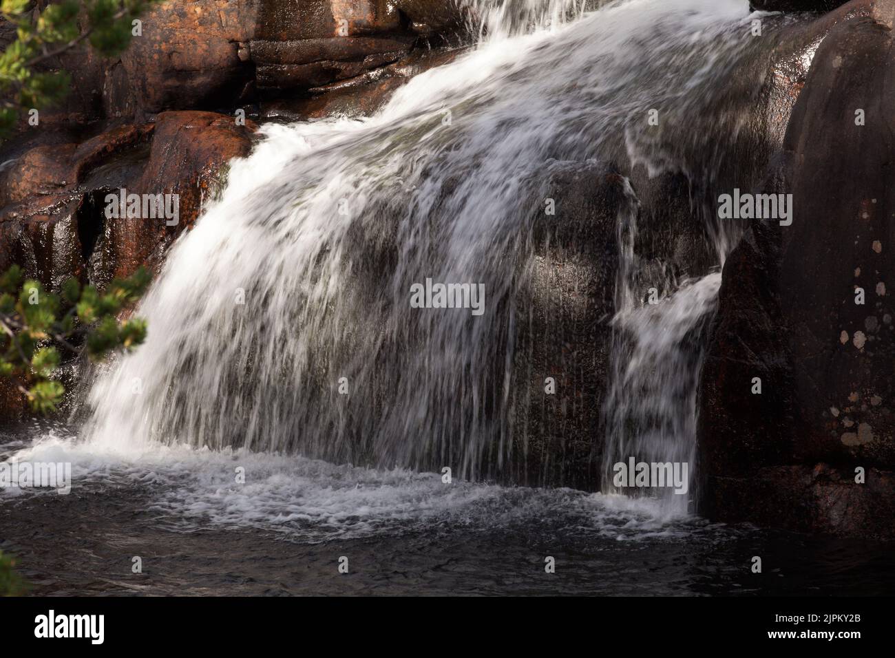 The Cascades of water in the big river. Powerful stream down the valley
