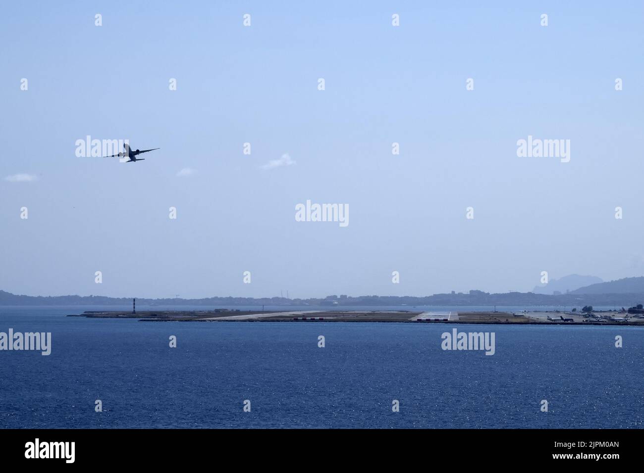 Airplane While Taking Off From Nice France Airport By The Sea Stock Airplane while taking off from nice france airport by the sea stock