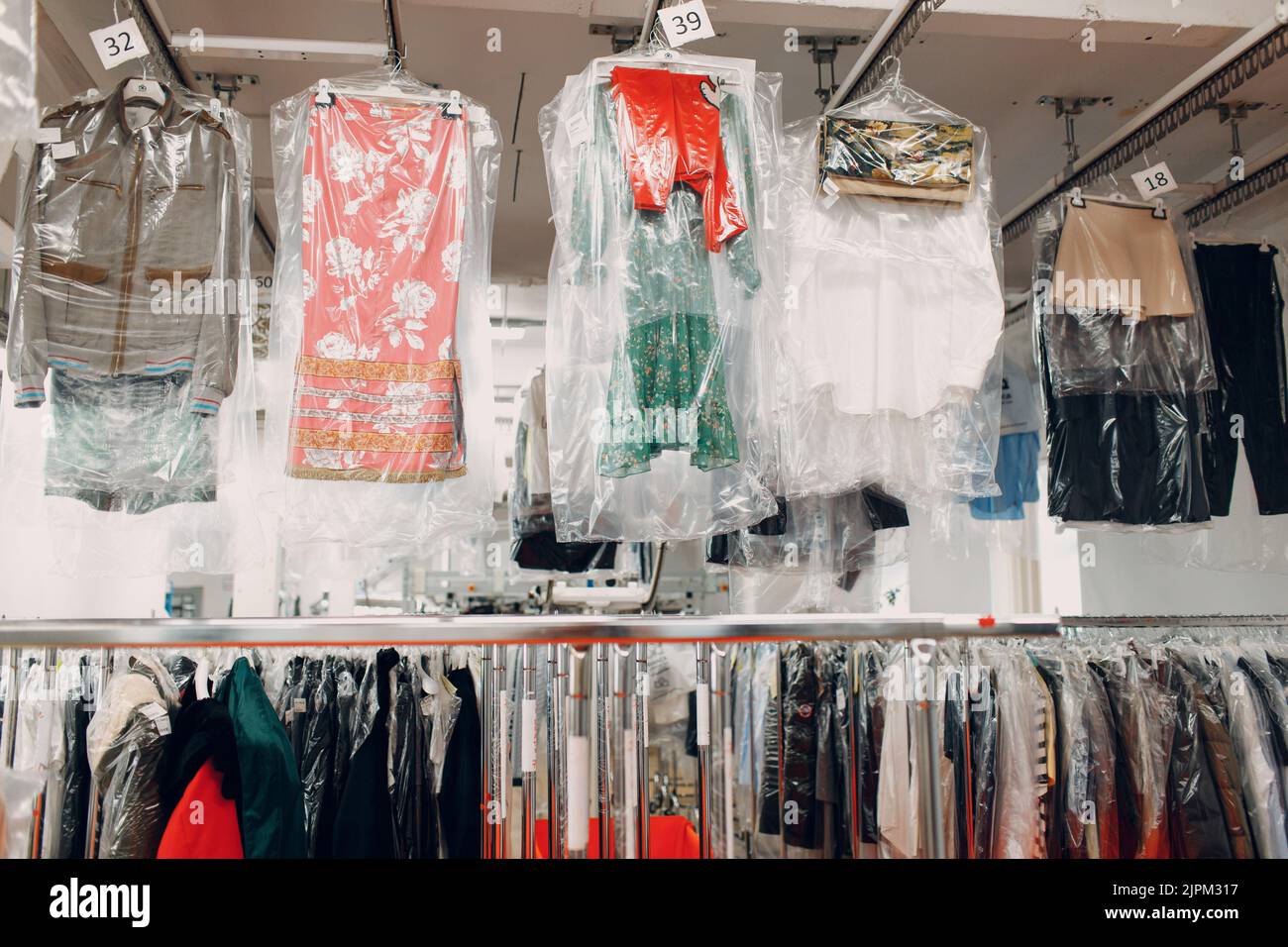 Dry cleaning clothes. Clean cloth chemical process. Laundry industrial