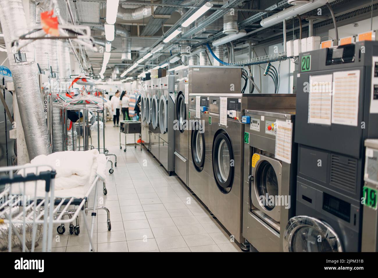 Dry cleaning clothes. Clean cloth chemical process. Laundry industrial