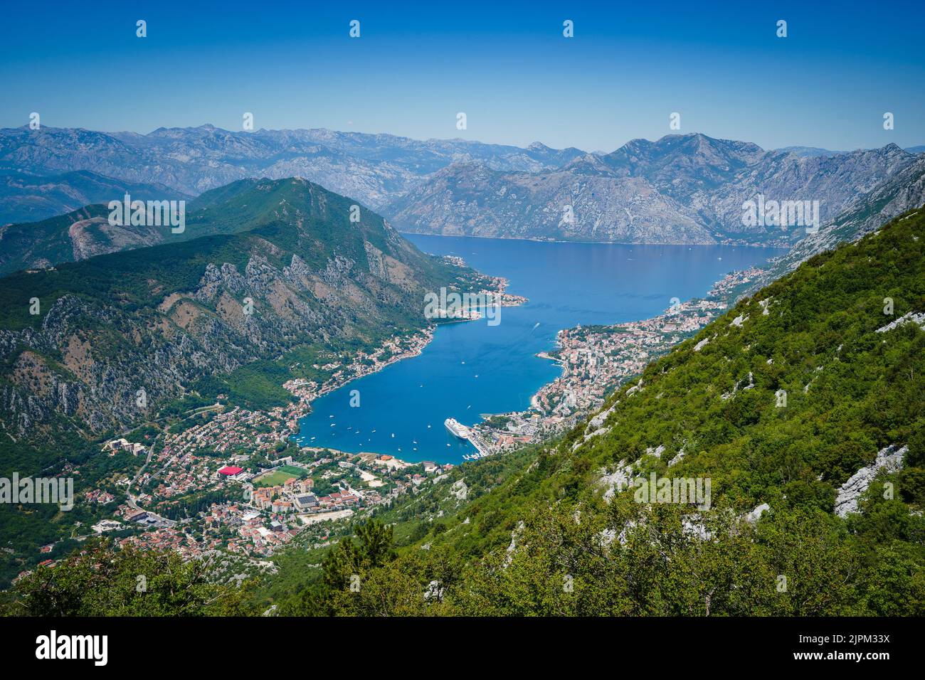 View over Kotor Bay, Montenegro from Serpentines on a clear, cloudless day near Trojica Observation Deck. Stock Photo