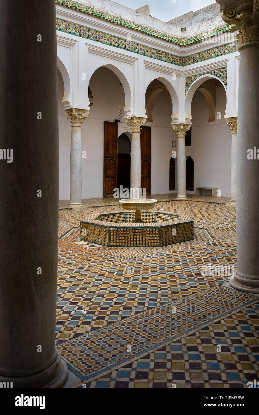 An interior of Kasbah museum surrounded decorated walls and column in ...