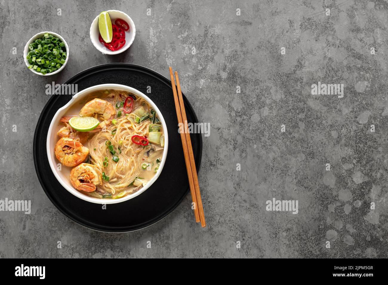 A typical bowl of curry laksa, spicy glass noodle dish popular in