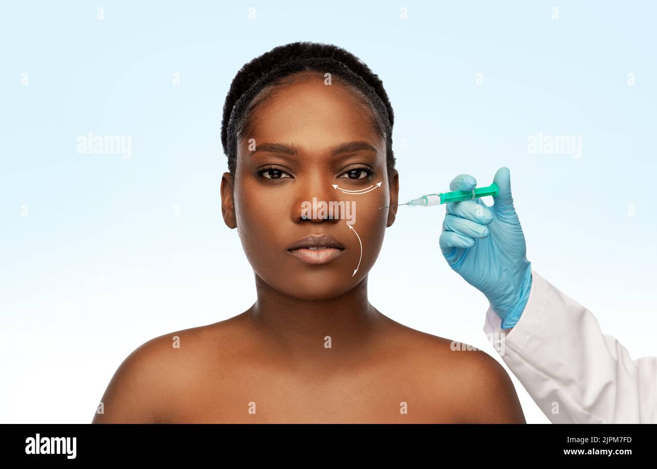 woman and plastic surgeon's hand with syringe Stock Photo Alamy
