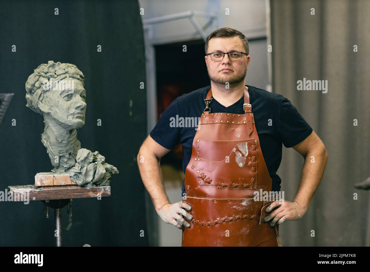 Man sculptor portrait sculpt bust clay human woman sculpture. Statue