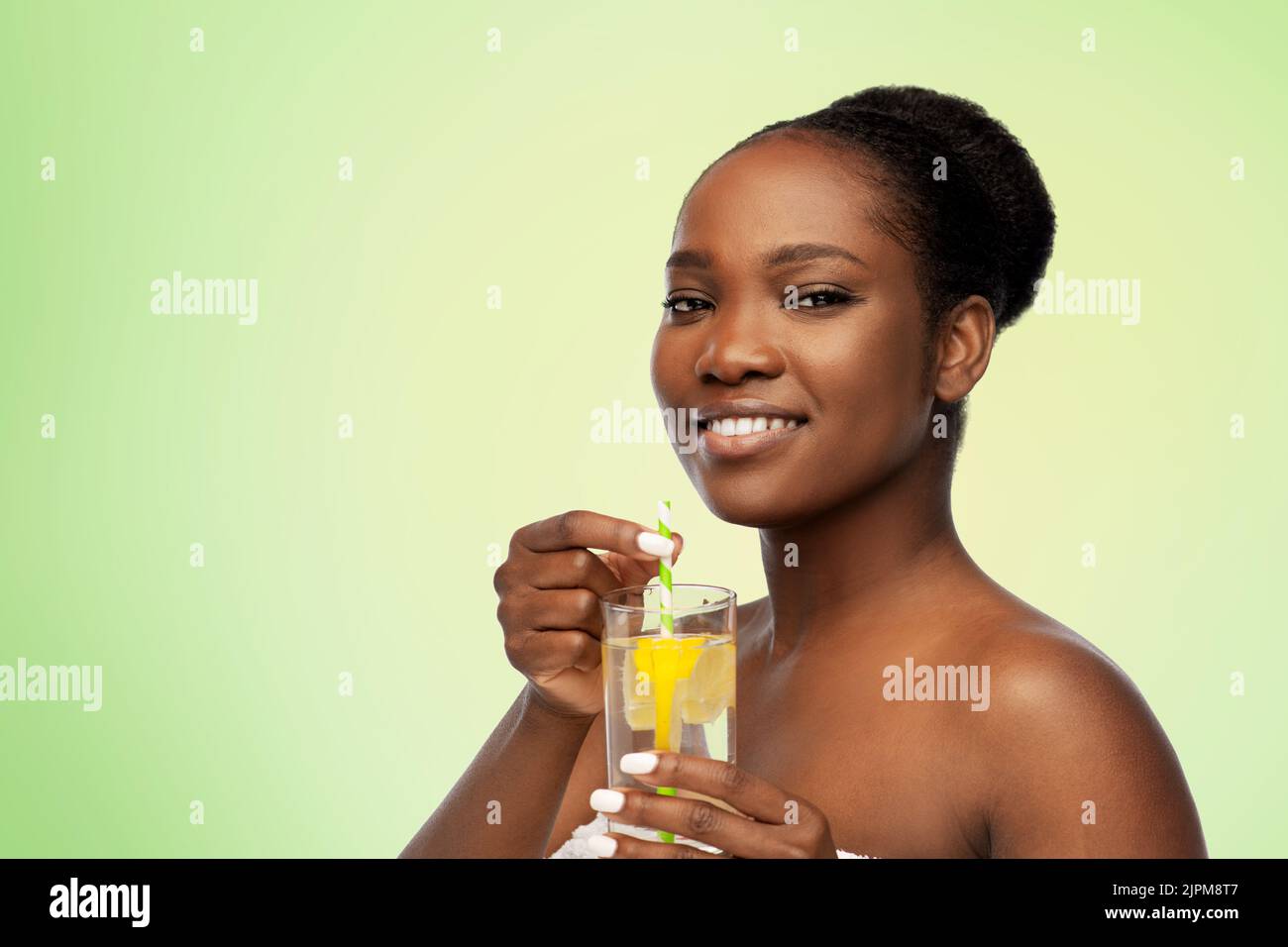 Women In White Underwear Holding Glasses Of Water With Lemon Stock