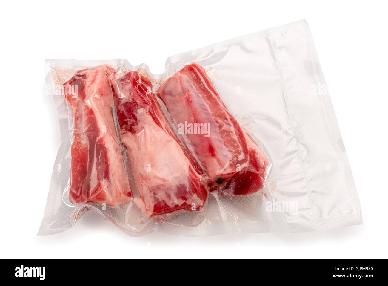 Pork ribs in vacuum packed sealed for sous vide cooking on white background in top view Stock Photo