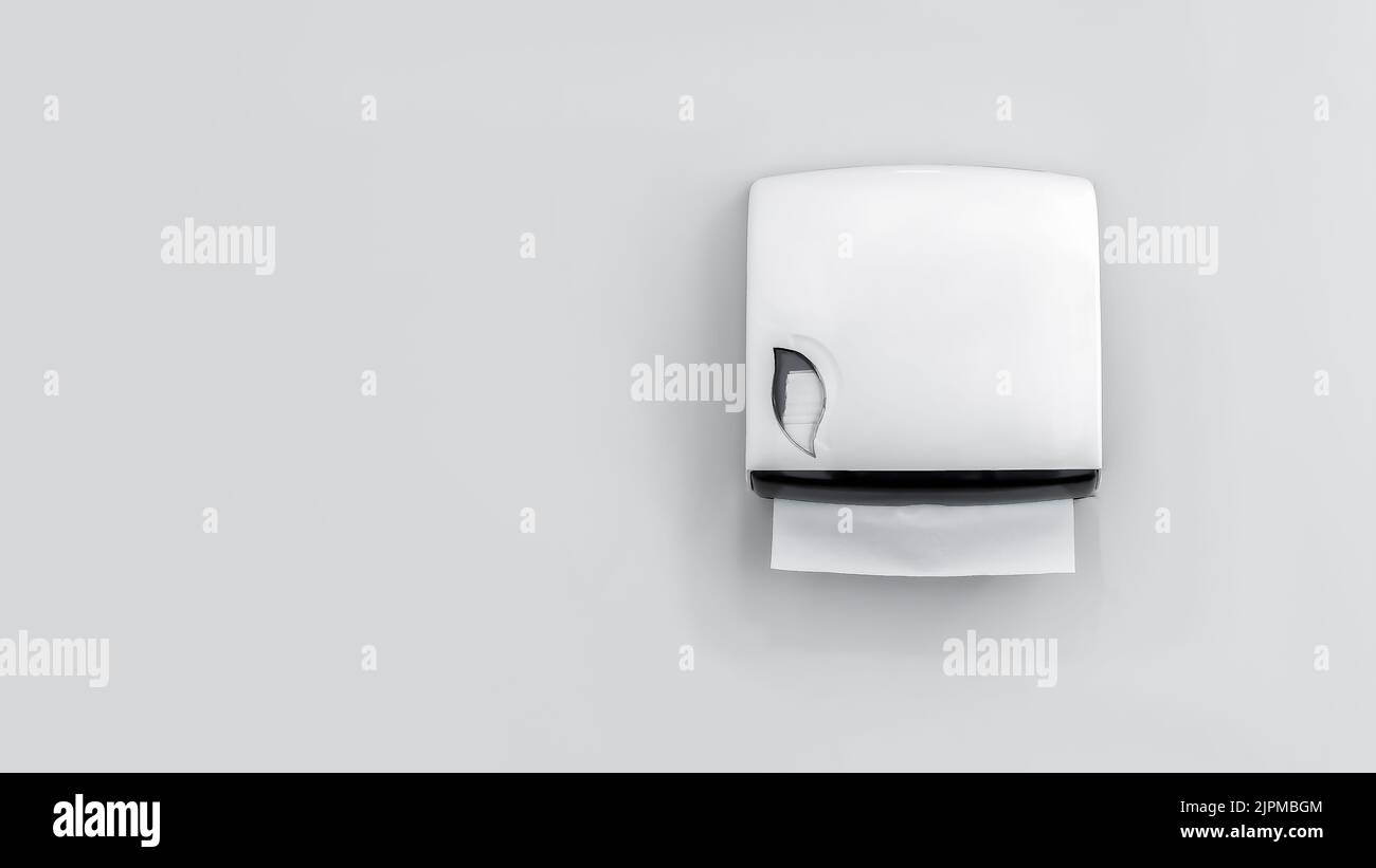 A box of toilet paper in the bathroom on a white background Stock Photo