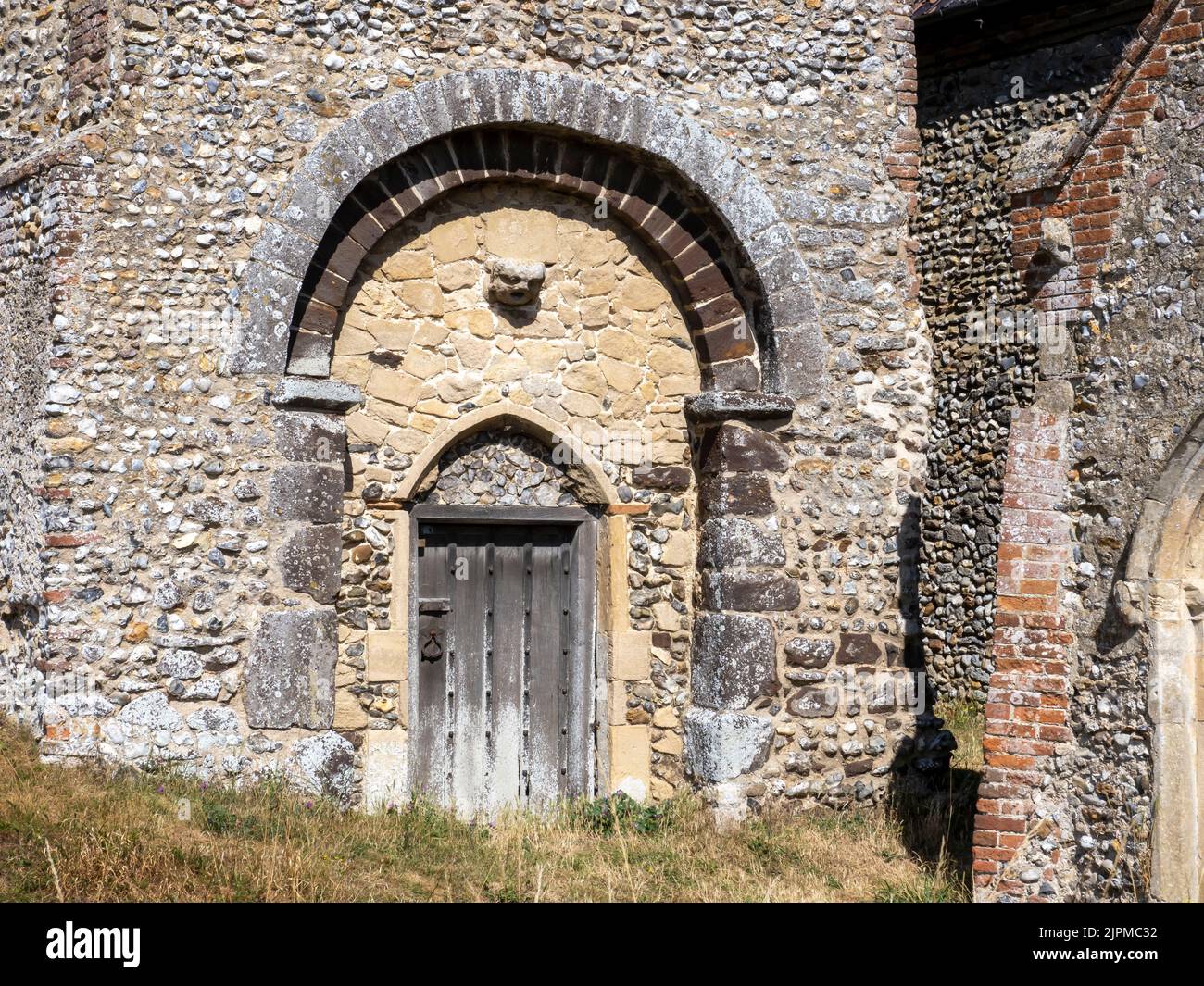St Andrew church at Little Snoring, Norfolk, UK with a detatched Saxon round tower. Stock Photo