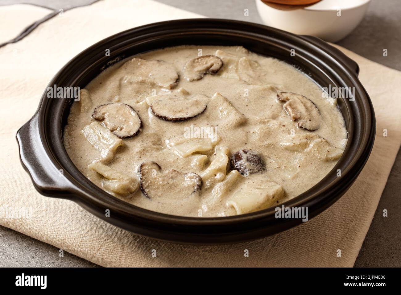 broth made from perilla. A dish made from thinly spread dough. Korean food culture Stock Photo