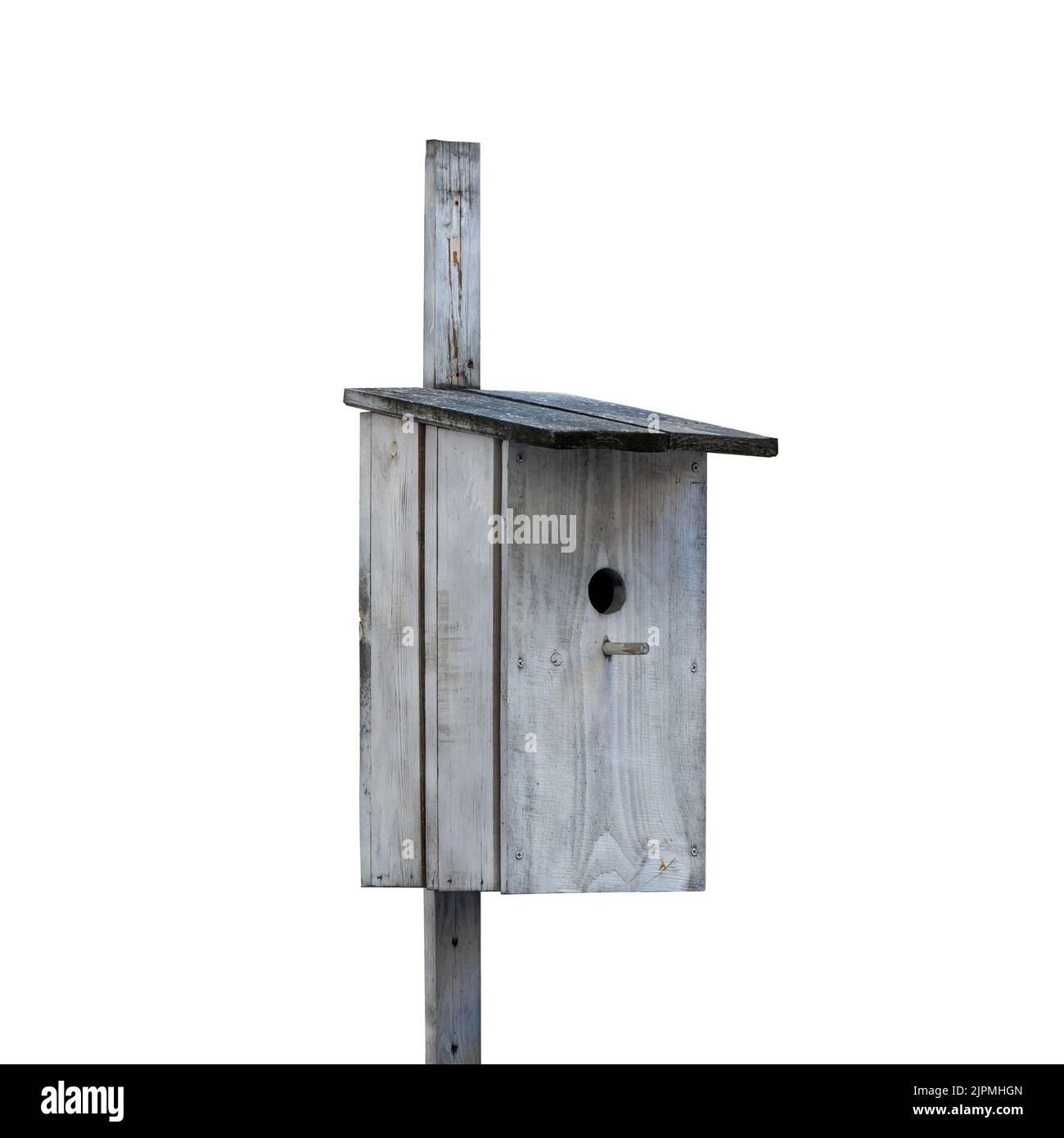 Wooden old birdhouse for small birds. Isolated on a white background. Stock Photo