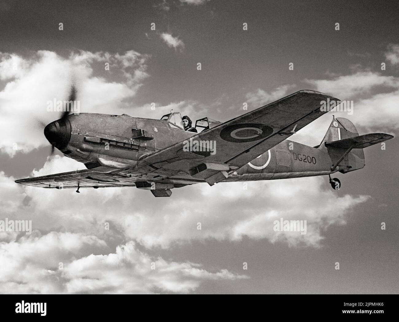 A captured Messerschmitt Bf 109E-3, DG200, in flight while serving with No. 1426 (Enemy Aircraft) Flight. The aircraft was force-landed at Manston, Kent, on 27 November 1940, after being attacked by Supermarine Spitfires of No. 66 Squadron RAF over the Thames estuary. After repair at the Royal Aircraft Establishment it was delivered to Rolls-Royce Ltd in 1941 for engine performance tests. It was later passed to the Aircraft and Armament Experimental Establishment at Boscombe Down, and put into storage. Stock Photo