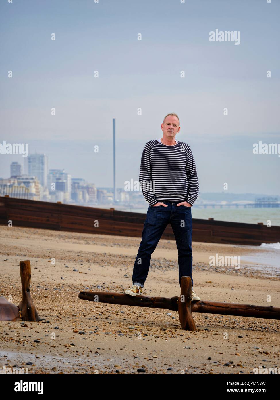 Editorial Use Only - Norman Cook photographed at his seafront home in Hove, East Sussex, UK. March 2022. Picture by Jim Holden Stock Photo