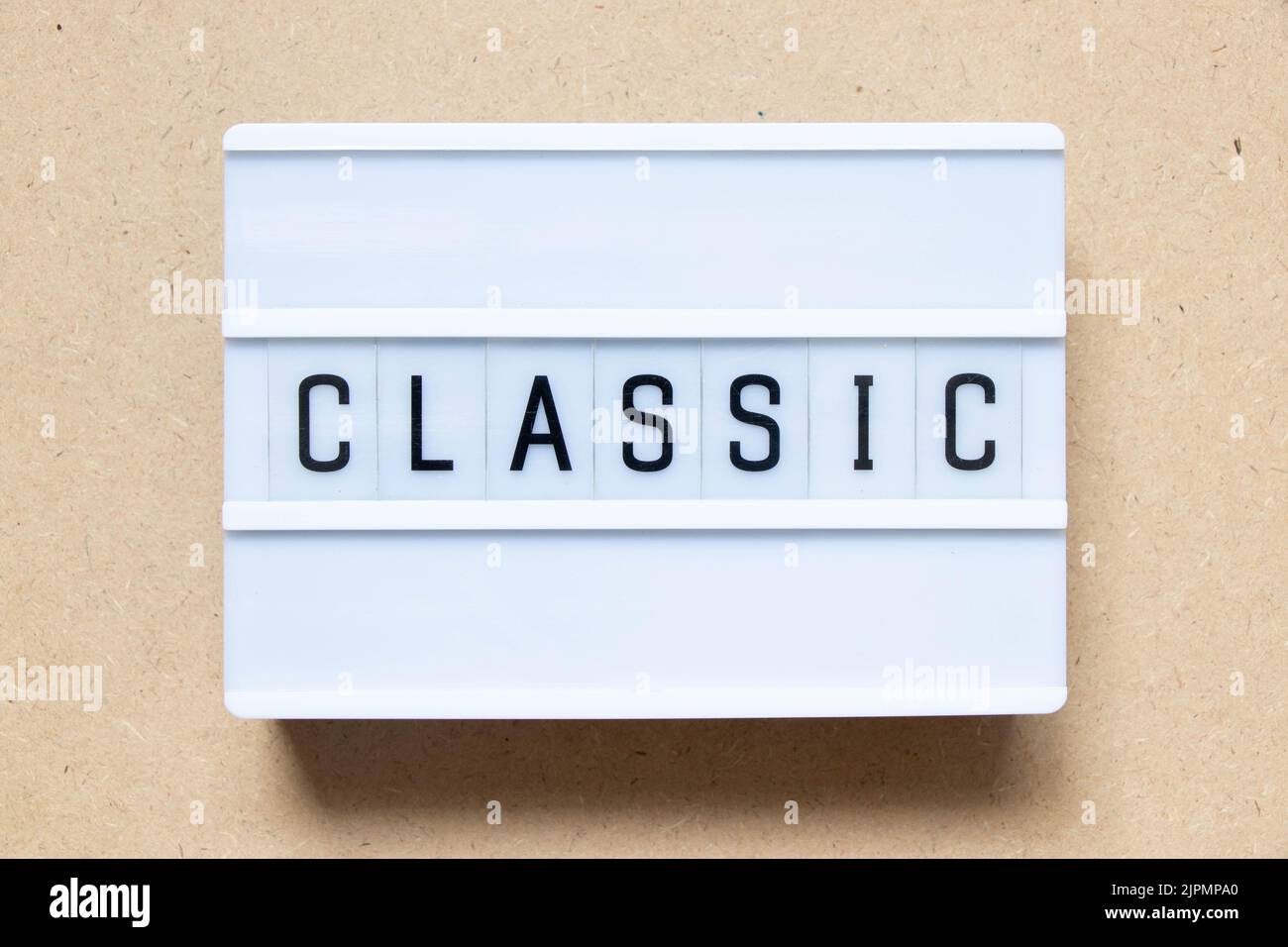 Lightbox with word classic on wood background Stock Photo