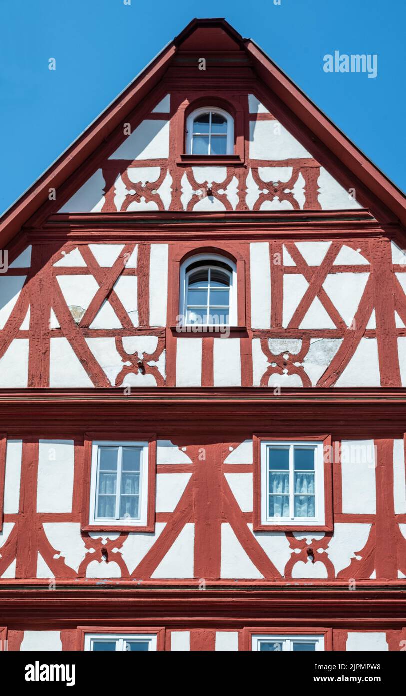 Germany, Miltenberg, detail of the facade of an  ancient half-timbered house in the Main street, Stock Photo