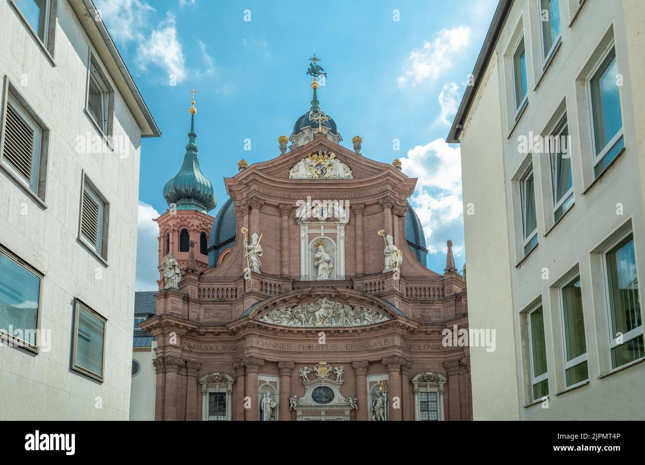 Germany, Wurzburg, view of the Baroque style facade of the Collegiate church Stock Photo