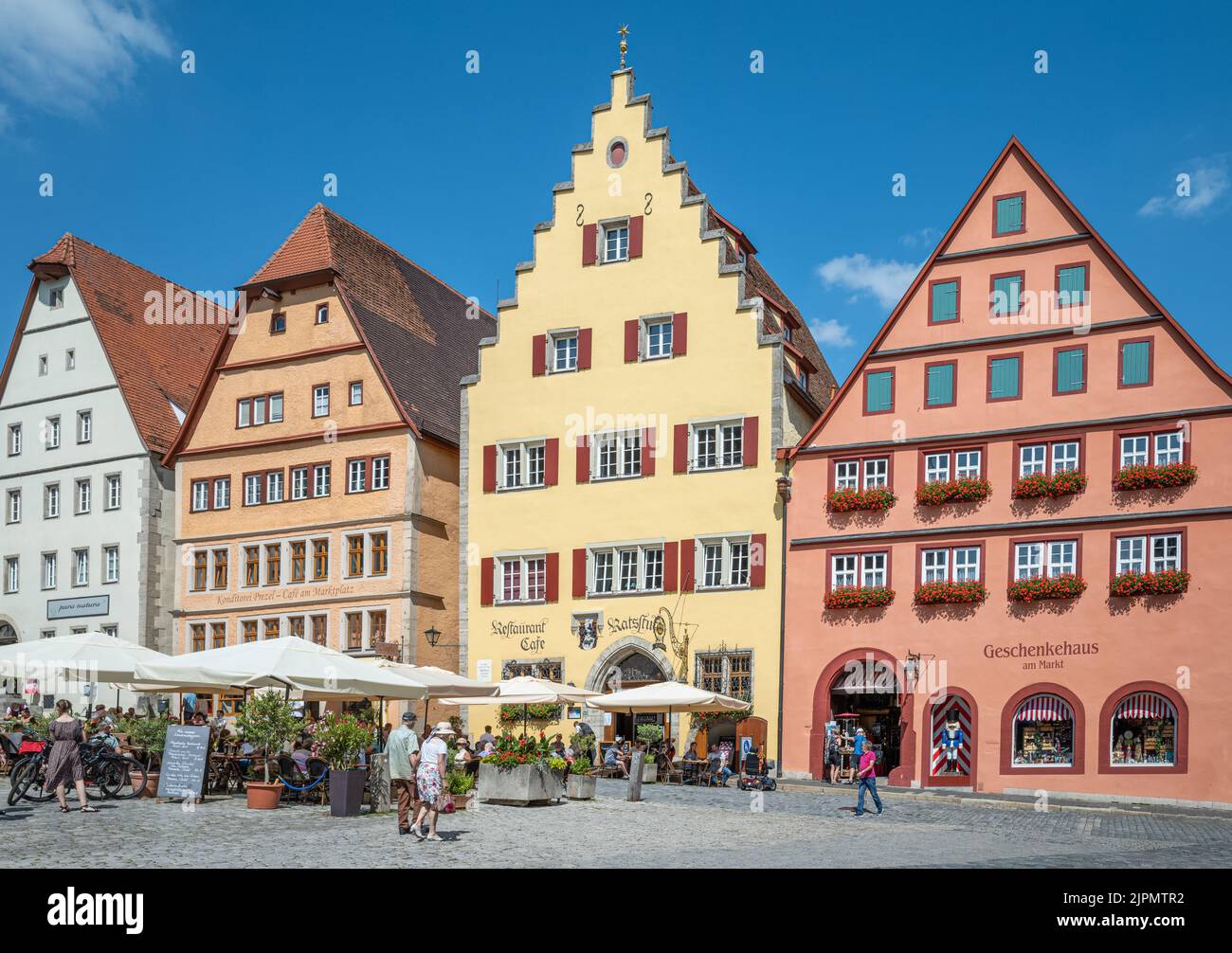 Rothenburg ob der Tauber, Germany - July 20, 2021: The medieval houses of Market square Stock Photo